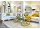 Bright and stylish living room with comfortable seating, gold accents, and an inviting atmosphere at 10120 E Topaz Dr, Scottsdale, AZ 85258
