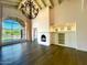 Elegant living room with hardwood floors, fireplace and high ceilings at 10120 E Topaz Dr, Scottsdale, AZ 85258