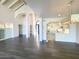 Bright living room with hardwood floors and a view into the kitchen at 10120 E Topaz Dr, Scottsdale, AZ 85258