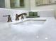 Close-up of vanity and sink with modern faucet and marble countertop at 10120 E Topaz Dr, Scottsdale, AZ 85258