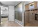 Modern bathroom with walk-in shower featuring stylish tile and a mosaic accent strip at 10129 E Ampere Ave, Mesa, AZ 85212