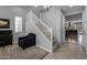 Entryway boasting a staircase and open floor plan, seamlessly connecting living spaces at 10129 E Ampere Ave, Mesa, AZ 85212