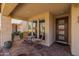 Inviting front porch with comfortable seating, perfect for relaxing and enjoying the outdoors at 10129 E Ampere Ave, Mesa, AZ 85212