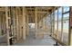 Unfinished interior shows the framing, electrical, and plumbing in the construction of a new home at 11441 E Utopia Ave, Mesa, AZ 85212