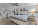 Main bedroom with ceiling fan and large windows at 11849 N 51St Dr, Glendale, AZ 85304