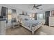 Main bedroom with ceiling fan and large windows at 11849 N 51St Dr, Glendale, AZ 85304