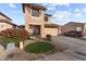 Two-story house with attached garage and landscaping at 11849 N 51St Dr, Glendale, AZ 85304