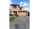 Two-story house with attached garage and landscaping at 11849 N 51St Dr, Glendale, AZ 85304