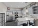 Modern kitchen featuring gray cabinets and granite countertops at 11849 N 51St Dr, Glendale, AZ 85304