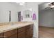 Double-sink bathroom with granite countertop and modern fixtures at 11995 E Pivot Peak --, Gold Canyon, AZ 85118