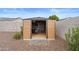 Tan storage shed with double doors, providing ample storage space at 11995 E Pivot Peak --, Gold Canyon, AZ 85118