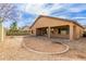 Landscaped backyard with a kidney-shaped area and gravel ground cover at 13756 W Watson Ln, Surprise, AZ 85379