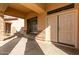 Home's exterior showcasing double doors and stone accents at 13756 W Watson Ln, Surprise, AZ 85379