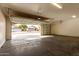 Spacious garage interior with an open view of the neighborhood at 13756 W Watson Ln, Surprise, AZ 85379