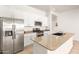 Modern kitchen featuring stainless steel appliances and granite countertops at 13756 W Watson Ln, Surprise, AZ 85379