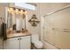 Clean bathroom with granite vanity, toilet, and shower/tub combo at 16043 W Copper Crest Ln, Surprise, AZ 85374