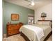 Guest bedroom with queen bed and plenty of natural light at 16043 W Copper Crest Ln, Surprise, AZ 85374