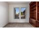 Spacious bedroom with carpeting and bright double windows at 16331 W Willow Creek Ln, Surprise, AZ 85374