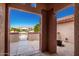 Covered front porch with views of neighborhood at 16331 W Willow Creek Ln, Surprise, AZ 85374