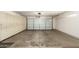 Garage with built-in storage cabinets at 16331 W Willow Creek Ln, Surprise, AZ 85374