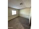 Bedroom with carpet and window at 16634 N Queen Esther Dr, Surprise, AZ 85378