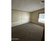 Simple bedroom with carpet and window at 16634 N Queen Esther Dr, Surprise, AZ 85378