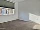 Bright bedroom with carpet flooring and large window at 1701 E Colter St # 421, Phoenix, AZ 85016