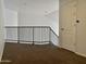 Loft area overlooking living room with black railing at 1701 E Colter St # 421, Phoenix, AZ 85016