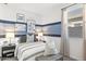 Bedroom with a basketball theme and sliding door closet at 17735 W Mission Ln, Waddell, AZ 85355