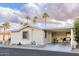 Single-level manufactured home with carport and desert landscaping at 1841 E Augusta Ave, Chandler, AZ 85249