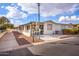 View of home's side, showing additional parking and walkway at 1841 E Augusta Ave, Chandler, AZ 85249