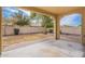 Relaxing backyard with a covered patio and desert landscaping for low maintenance living at 1851 W Pelican Dr, Chandler, AZ 85286