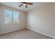 Neutral bedroom with carpet flooring and a window allowing natural light at 1851 W Pelican Dr, Chandler, AZ 85286