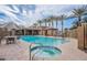 Resort-style community pool and spa with lounge seating and shaded areas, offering a luxurious outdoor experience at 1851 W Pelican Dr, Chandler, AZ 85286