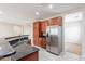 Kitchen featuring stainless steel appliances, granite countertops, backsplash and a large island with a sink at 1851 W Pelican Dr, Chandler, AZ 85286