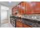 Kitchen featuring stainless steel appliances, granite countertops, and a mosaic backsplash, perfect for culinary enthusiasts at 1851 W Pelican Dr, Chandler, AZ 85286