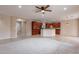 Spacious living room with tile and carpet flooring featuring an open layout and stylish design elements at 1851 W Pelican Dr, Chandler, AZ 85286