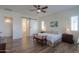 Bright bedroom with a barn door and en-suite bathroom at 20508 W Carlton Mnr Mnr, Buckeye, AZ 85396