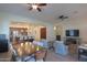 Open concept dining room with a view into the living room at 20508 W Carlton Mnr Mnr, Buckeye, AZ 85396