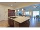 Island kitchen with a large quartz countertop and open layout at 20508 W Carlton Mnr Mnr, Buckeye, AZ 85396