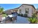 Outdoor dining area and lush landscaping enhance this inviting patio at 20508 W Carlton Mnr Mnr, Buckeye, AZ 85396