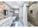 Modern bathroom with a clawfoot tub, double vanity, and walk-in shower at 2111 W Mulberry Dr, Phoenix, AZ 85015