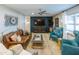 Relaxing living room with a large TV, comfy seating, and a stylish coffee table at 2111 W Mulberry Dr, Phoenix, AZ 85015