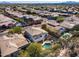 Two-story house with a three-car garage, pool, and mountain views at 22432 N 48Th St, Phoenix, AZ 85054