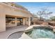 Relaxing backyard oasis with a sparkling pool, patio, and built-in BBQ at 22432 N 48Th St, Phoenix, AZ 85054