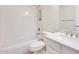 Clean bathroom with white subway tile and quartz vanity at 22432 N 48Th St, Phoenix, AZ 85054