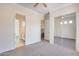 Bedroom with mirrored closet doors and ensuite bathroom access at 22432 N 48Th St, Phoenix, AZ 85054