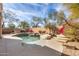 Inviting kidney-shaped pool with a cascading waterfall and spa at 22432 N 48Th St, Phoenix, AZ 85054