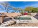 Private pool area with a waterfall feature and plenty of space for lounging at 22432 N 48Th St, Phoenix, AZ 85054