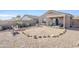 Spacious backyard with a fire pit and patio furniture at 24191 N Desert Dr, Florence, AZ 85132